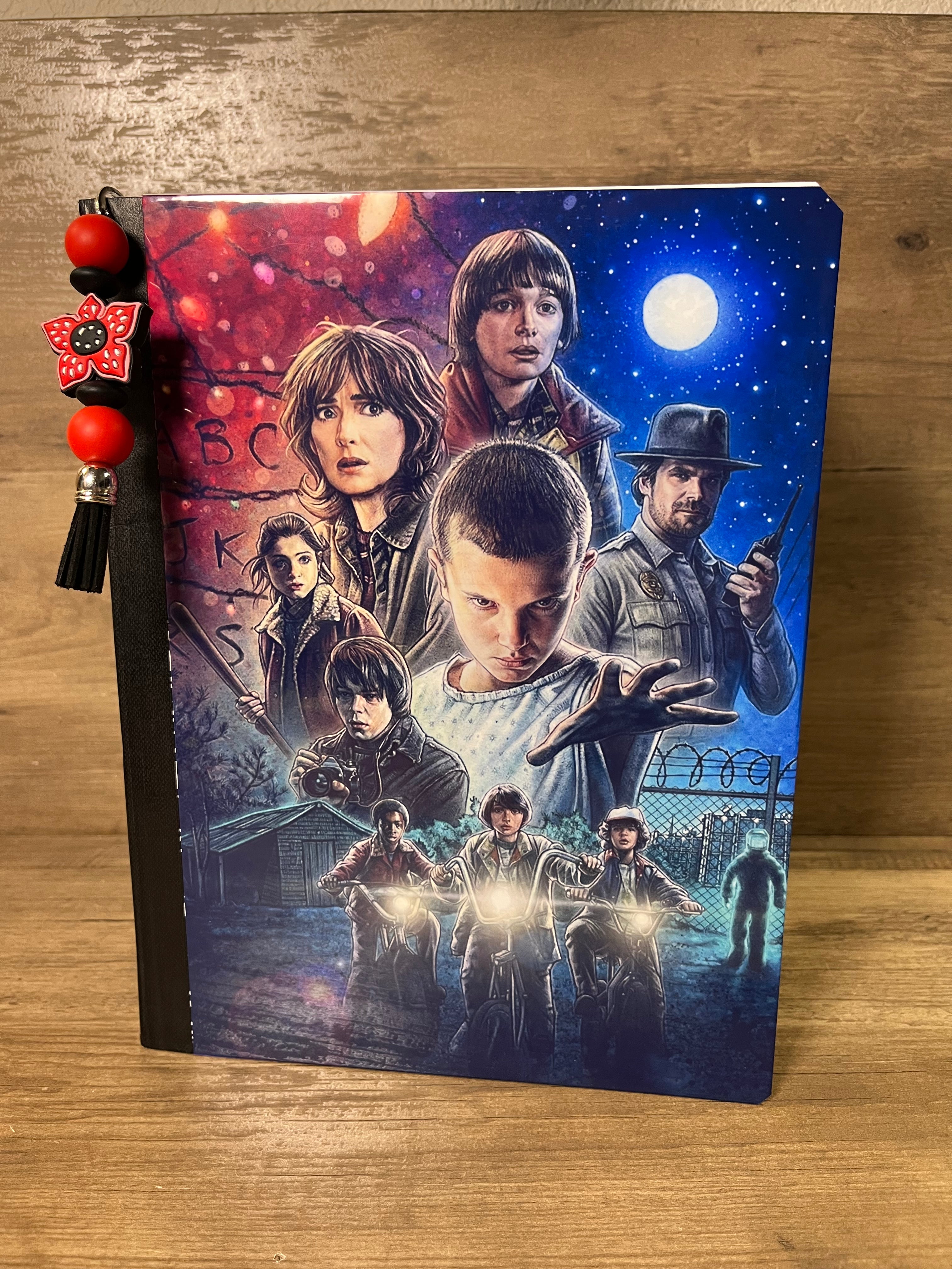 Upside Down Quad Design Notebook with Demogorgon-themed bookmarker