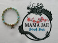 Green Jade Beaded Bracelet with Gold Accents & Bow Charm
