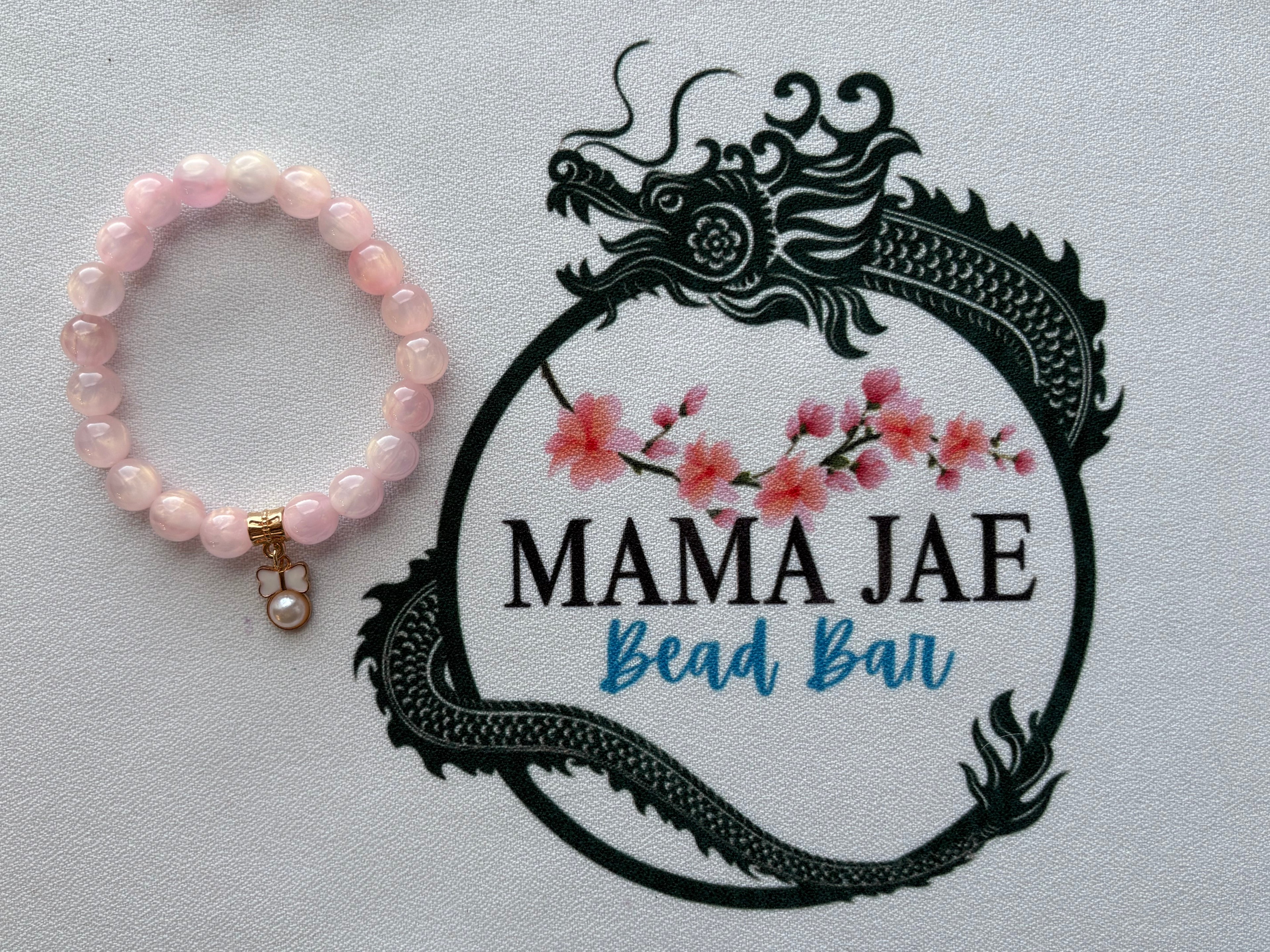 Rose Quartz Bow Pearl Charm Bracelet
